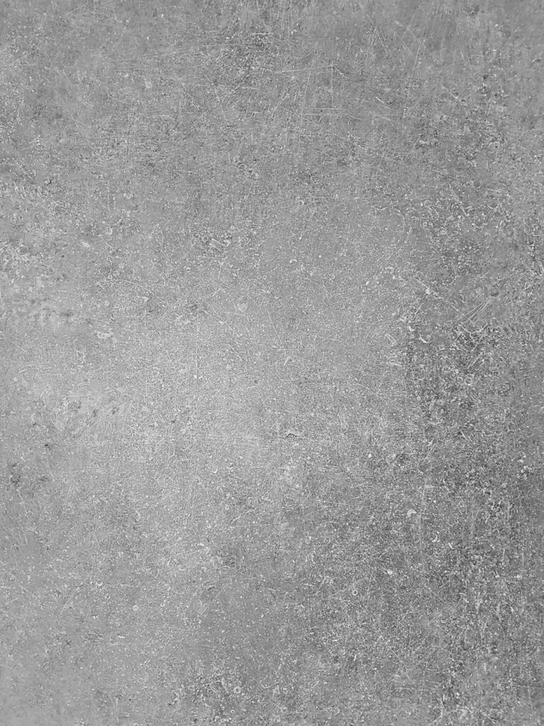 a black and white photo of a concrete wall