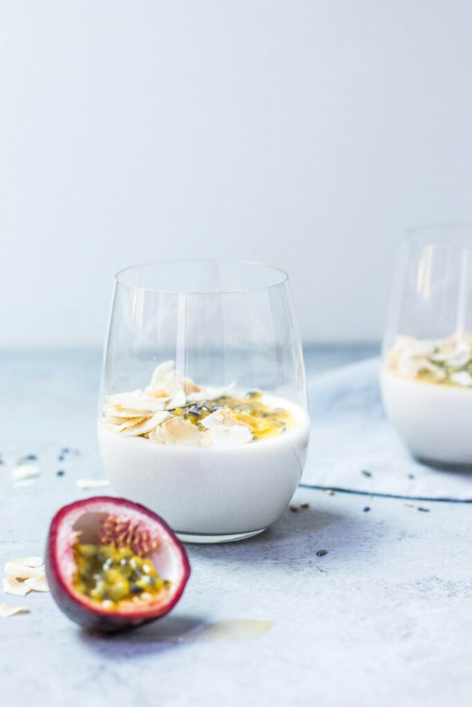 clear glass cup with white liquid