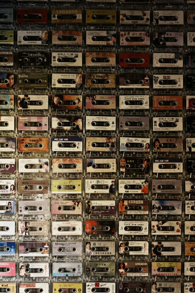 Wall covered with many vintage cassette tapes